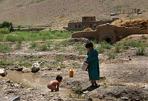 Children at a creek, Afghanistan