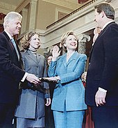 Clinton being sworn in as U.S. Senator by Vice President Al Gore in 2000. Her husband Bill and daughter Chelsea are looking on.