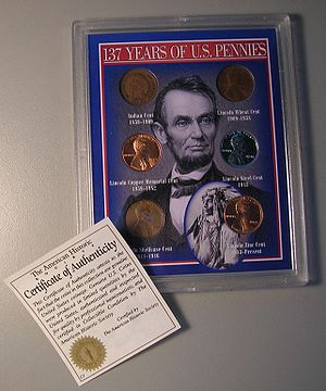 A Certificate of Authenticity with a Coin Set