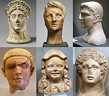 Etruscan votive heads IV-II century BC found in various sanctuaries of Etruria Etruscan votive heads IV-II century BC.jpg
