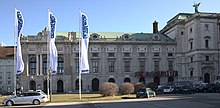 OSCE Permanent Council venue at the Hofburg, Vienna Fahnen der Organisation fur Sicherheit und Zusammenarbeit in Europa vor dem Kongress- und Veranstaltungszentrum Hofburg.jpg