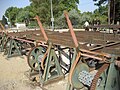 Gears on top that move the walls into place to allow a flow without entering the canal.