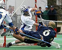 A player taking a "dive shot" Lacrosse dive shot.jpg