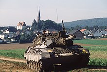 A West German army Leopard 1A1A1 with additional spaced armour on the turret and gun mantlet. Leopard1 Bundeswehr 1983.jpg