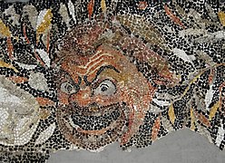 Detalle de un mosaico del barrio de los Joyeros de Delos que muestra una máscara de teatro.