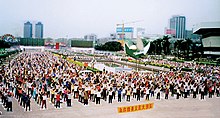 Practitioners of Falun Gong perform spiritual exercises in Guangzhou, China. Origins-GuangzhouPractice.jpg