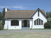 The George H. Vradenburg House/Tudor Revival Residence was built in 1925 and is located at 1600 W. Colter St. It was listed in the National Register of Historic Places in March 2003 , reference #10000156.