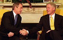 President-elect Bush speaks with outgoing president Bill Clinton in the Oval Office on December 19, 2000 President Bill Clinton and President-Elect George W. Bush shake hands during their meeting in the Oval Office (1).jpg