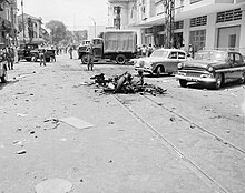 Vietcong car bombing aftermath scene in Saigon, 1965. Scene of Viet Cong terrorist bombing in Saigon, Republic of Vietnam., 1965.jpg