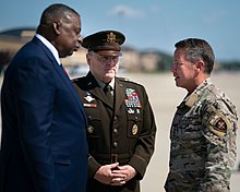 Milley and Defense Secretary Lloyd Austin welcome General "Scott" Miller at Joint Base Andrews during the 2021 Afghanistan withdrawal, July 14, 2021. SecDef & CJCS welcome Gen. Miller back from Afghanistan.jpg