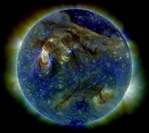The Sun shows a C3-class solar flare (white ar...