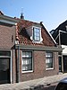 Dwars huis van één bouwlaag