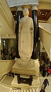 The Amitābha Buddha from Hancui on display in the museum's stairwell, China, 6th century AD