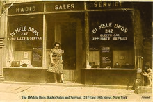 Armand at his parent's radio store (5 years old)