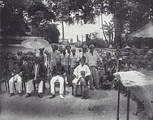 A portrait of the King and his entourage in Ambon, Maluku, between 1890 and 1915. COLLECTIE TROPENMUSEUM Portret van een vorst met zijn gevolg Ambon TMnr 60039375.jpg