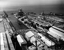Enterprise is christened at Newport News shipyard in 1960. USS Enterprise (CVAN-65) christening at Neport News SB 1960.jpg