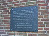 Plaquette bij het stadhuis