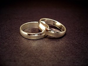 A couple of 14-carat gold wedding rings. Pictu...