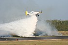 An AT-802 dropping a full load of fire suppressant