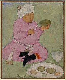 Abdullah Khan Uzbek II slicing melons.jpg