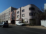 Apart from minor changes, the buildings have survived substantially intact and are excellent examples of small suburban "maisonettes" in the Art Deco Moderne Style. They are the only buildings of their kind in Parktown North.