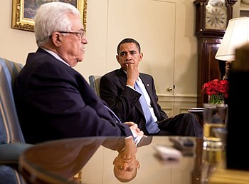 President Barack Obama listens as Palestinian ...