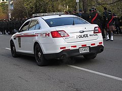 A Ford Police Interceptor Sedan with Canadian Forces Military Police markings.