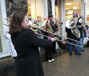 English: Brass band playing Christmas carols S...