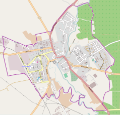 Mapa konturowa Dobrego Miasta, blisko centrum na lewo znajduje się punkt z opisem „Wieża ciśnień w Dobrym Mieście”