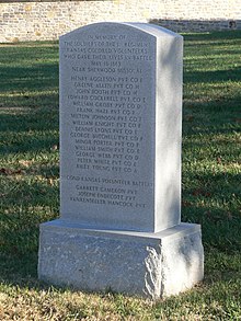 Stone marker inscribed "In memory of the soldiers of the 1st Regiment Kansas Colored Volunteers who gave their lives in battle May 18, 1863 near Sherwood, Missouri", followed by 15 names; after which "Second Kansas Volunteer Battery", followed by three more names
