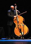 Composer Gavin Bryars playing the double bass