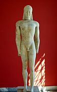 Kouros de Volomandra, v. 550. Comparé au Cavalier Rampin. Marbre, 1,79 m. MNArch Athènes[104]