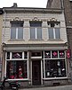 Winkel-woonhuis met voorgevel in eclectische stijl