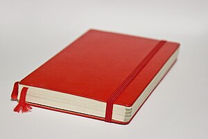 Moleskine notebook.