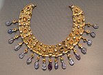 Collier; late 6th–7th century; gold, an emerald, a sapphire, amethysts and pearls; diameter: 23 cm (9.1 in); from a Constantinopolitan workshop; Antikensammlung Berlin (Berlin, Germany)[228]