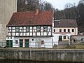 Wohnhaus, Torbogen, Mauerwerksreste und Hofpflaster der ehemaligen Schloßmühle, einer Mahl- und Brettmühle (Einzeldenkmale der Sachgesamtheit 09305857)