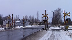 Seututie 701 Suupohjan radan tasoristeyksen kohdalla Ilmajoella.