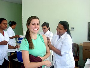 English: Woman receiving rubella vaccination, ...