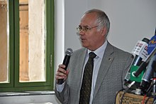 Canadian Ambassador William Crosbie makes remarks during the opening of the refurbished Turquoise Mountain Foundation in Kabul on 9 May 2011. William Crosbie speaking in May 2011.jpg