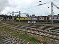 Bhubaneswar Rajdhani being hauled by a Duronto-liveried WAP-7 of Ghaziabad Loco Shed.