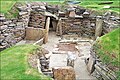 Skara Brae sur l'île des Orcades. Entrée et cours d'une maison.