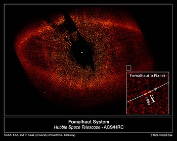 Hubble views the Fomalhaut system. This false-color image was taken in October 2004 and July 2006 with the Advanced Camera for Surveys. Formalhaut b.jpg