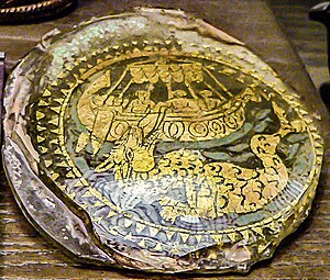 Rather roughly trimmed Christian piece with Jonah and the Whale, 10.5 cm across, 4th century Jonas et la baleine, verre dore, Louvre.JPG