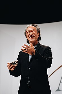 Makoto Fujimara explains kintsugi ceramic art during a speech at the Alliance for Responsible Citizenship, London, November 2023. Makoto Fujimara explains Kintsugi ceramic art during a speech, in London, November 2023.jpg