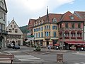 Munster, viewto a street: Place du Marché-rue Saint-Gregoire-Grand Rue with townhall