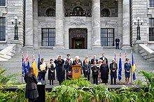 New Zealand Herald Extraordinary Phillip O'Shea reads the proclamation on the steps of the New Zealand Parliament Buildings Proclamation of accession ceremony for King Charles III, Wellington, New Zealand.jpg