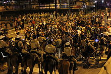 Police surround protestors during a nighttime demonstration on August 30 RNC Tampa August 30 2012.jpg