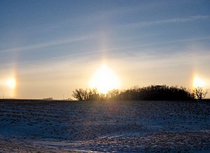 English: Sun dogs during sunset outside of New...