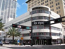 La Epoca is an upscale Miami department store, whose Spanish name comes from Cuba. La Epoca is an example of the many businesses started and owned by Spanish-speakers in the United States. WalgreenDrugStoreMiami.jpg