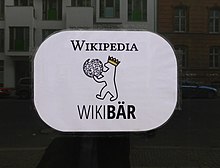 WikiBär logo on the storefront of the local space in Berlin